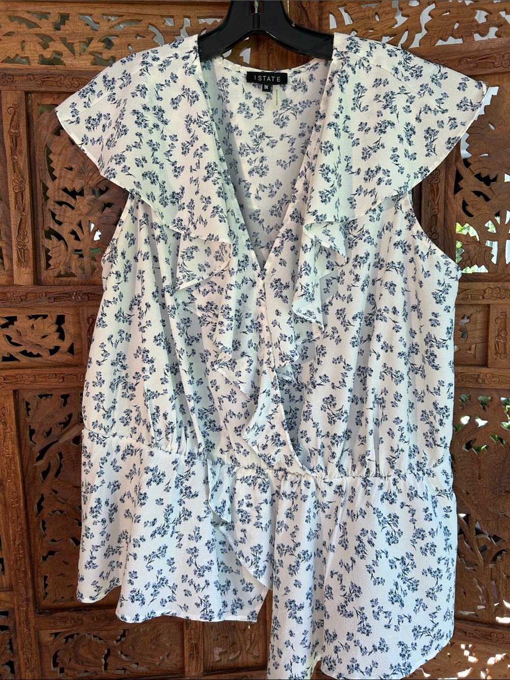 1.STATE White Blouse with Blue Floral Print and Ruffled asymmetrical hem.
1X
